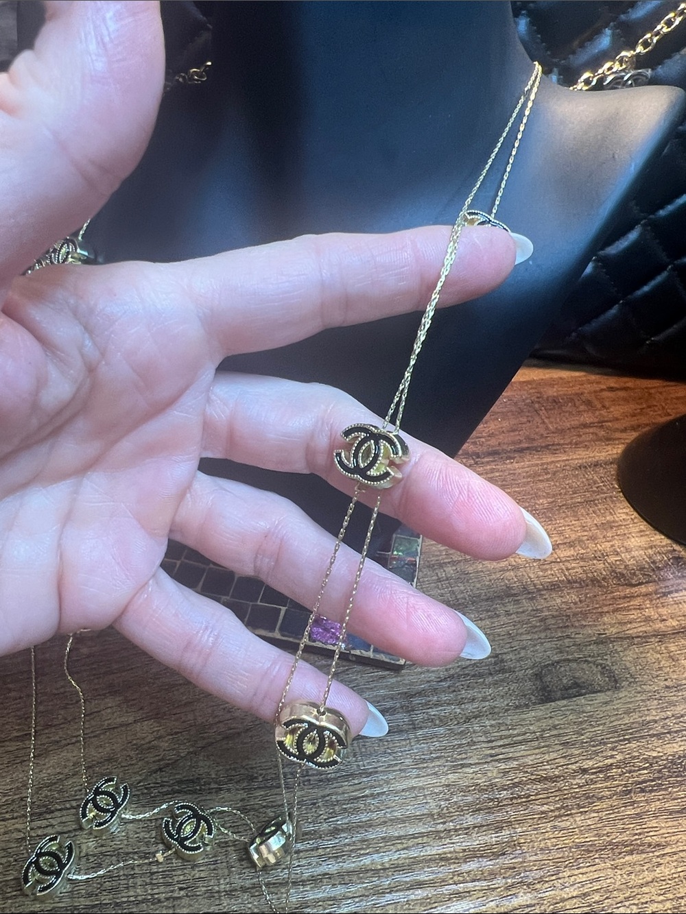 Gold-Tone Multi-Layer Logo Pendant Necklace - Picture 9 of 11